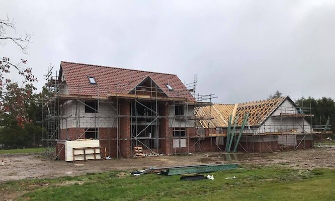 Roofer Norfolk working on property in Coston